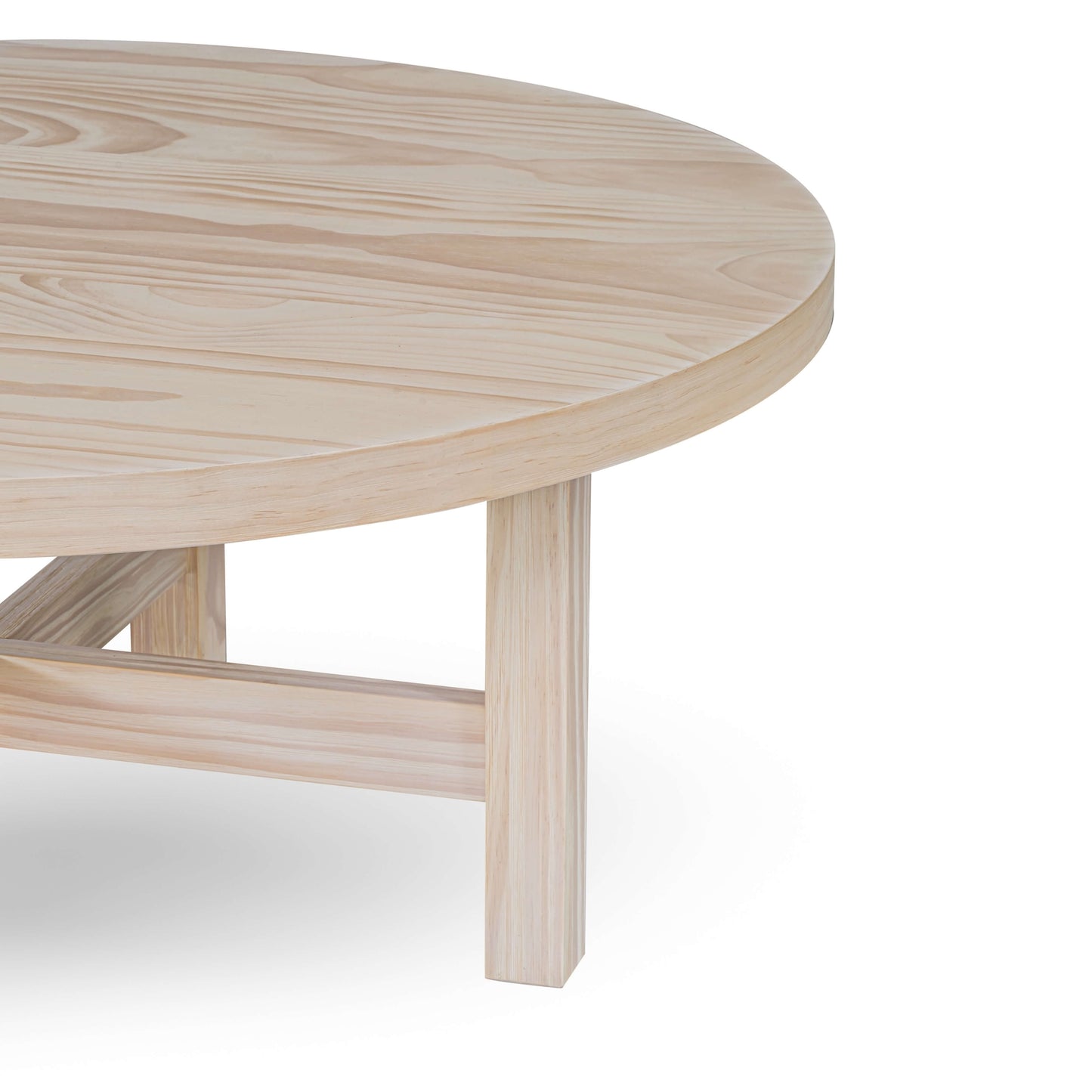 close up view of Helio Coffee Table with round top  in natural pine wood finish.