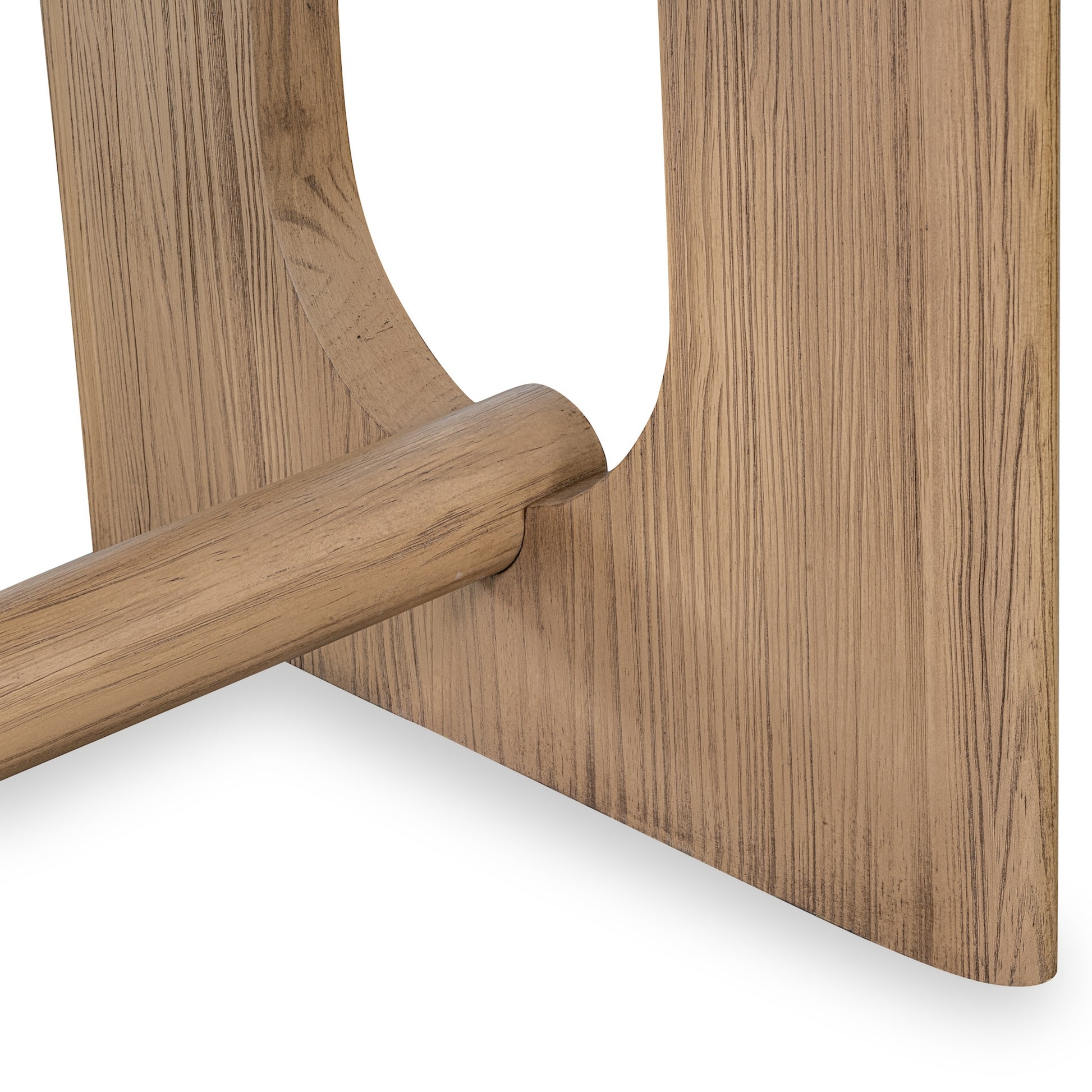 the close up view of the support bar of a modern solid wood dining table.